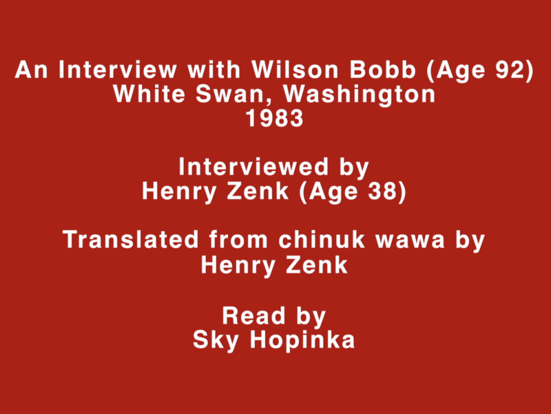 White text on a red background reading: An Interview with Wilson Bobb (Age 92) White Swan, Washington 1983 Interviewed by Henry Zenk (Age 38) Translated from chinuk wawa by Henry Zenk Read by Sky Hopinka