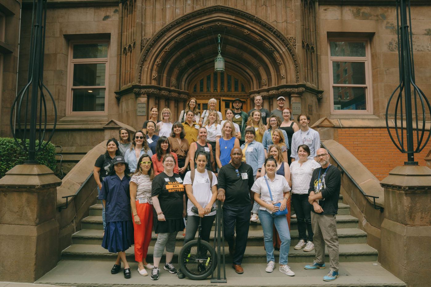 2022 Summer Institute Educators standing on the front steps of Teachers College at Columbia University.