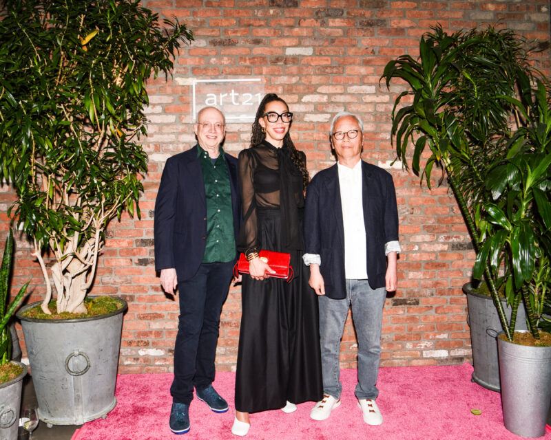 David Howe, Amy Sherald, and Hiroshi Sugimoto standing in front of a brick wall with the Art21 logo behind them.