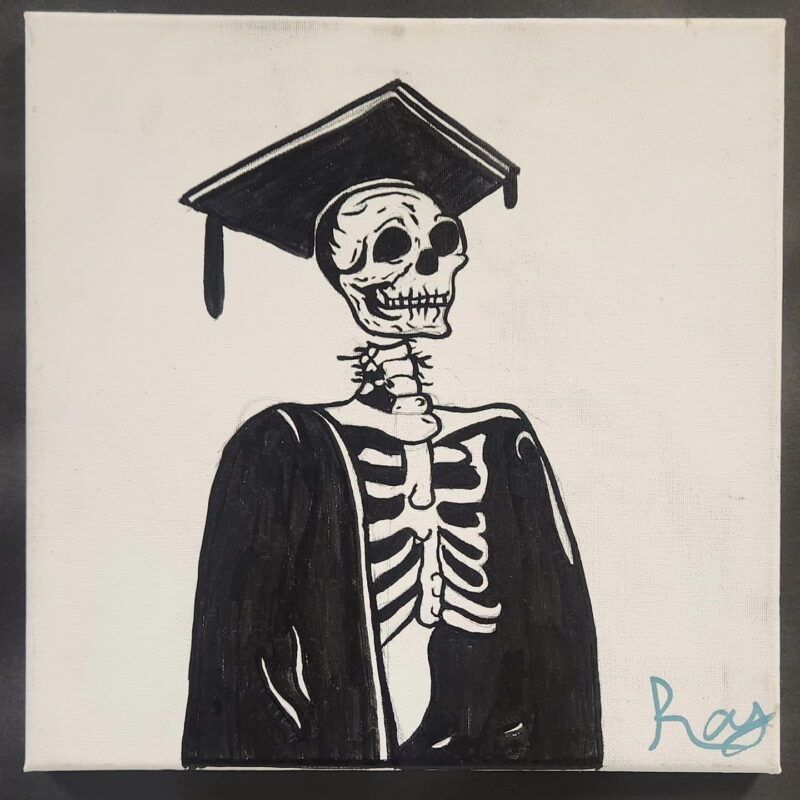 Black and white drawing of a skeleton wearing a graduation cap and gown.